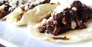Two Mole Sauce Tacos Image
