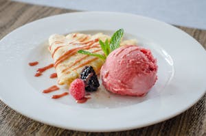Warm Apple Crepes with Raspberry Sorbet Image