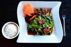 E8. Kale with Crispy Pork Image