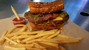 Double Patty wedged between 2 Grilled Cheese Image