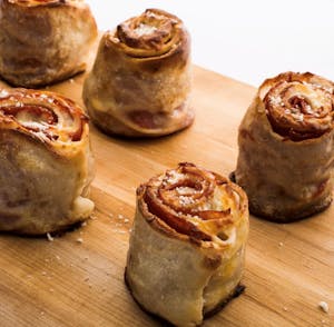 BAKED CALZONES & STROMBOLIS Image