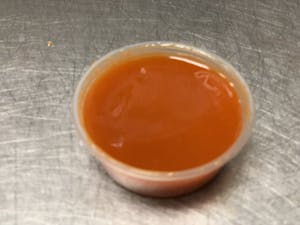 Cut of Hot Wing Sauce Image