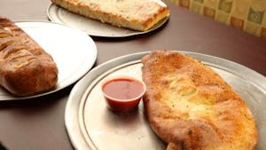 CALZONES & STROMBOLIS Image