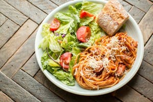 Spaghetti with Garden Salad & Garlic Bread Image