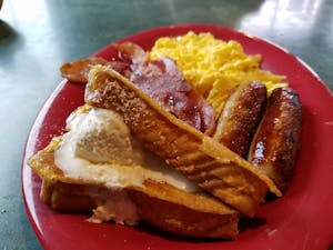 15. (40) Pieces of French Toast with Eggs, Bacon, & Sausage Image