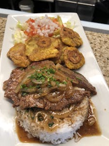Bistec Encebollado
Image