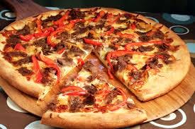 CheeseSteak PIZZA - Steak, Peppers, Onions, Mushrooms & Mozzarella Image