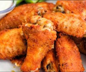 26 Chicken Wings with fries Image