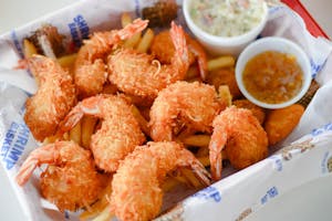 Jumbo Shrimp Basket with Seasoned fries and 16 oz drink Image
