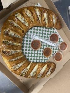 monday & tuesday special large 3 topping pizza with large calzone of your choice and 16 oz drink fo Image