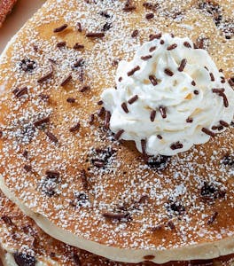 Order Chocolate Chip Pancakes (2) (660 cal) food online from Jimmy Egg store, Tahlequah on bringmethat.com