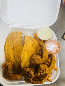 Order 15. Wings (4) & Catfish (2) COMBO food online from GJ Fish & Chicken store, Kansas City on bringmethat.com