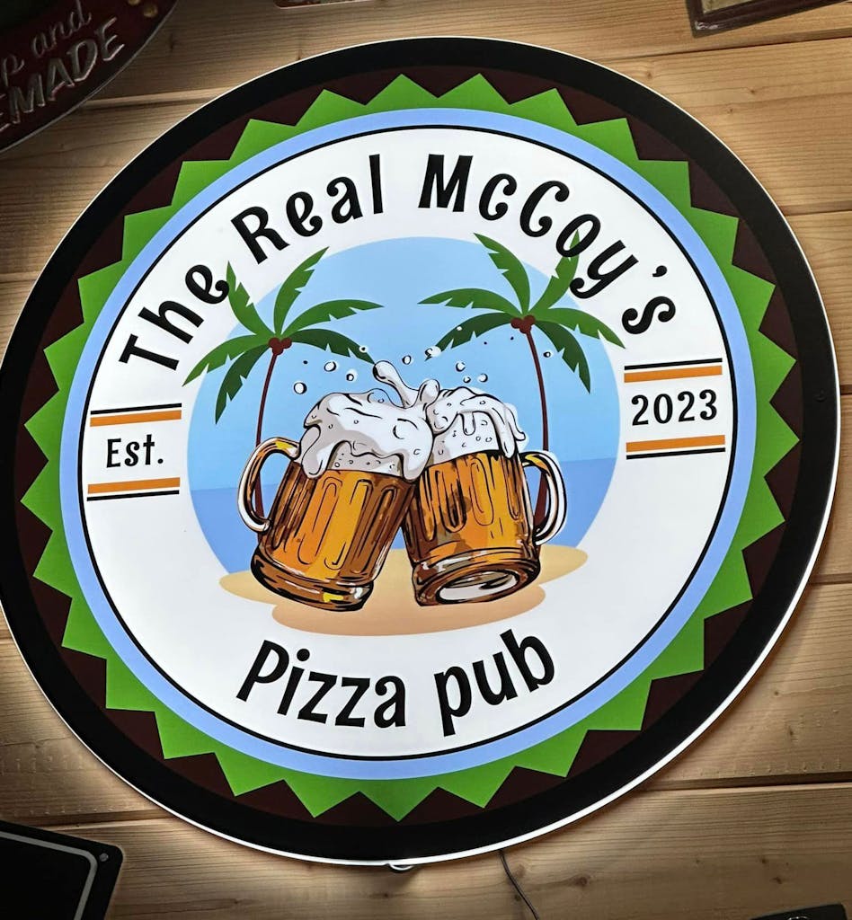 The Real McCoys Pizza Pub Logo