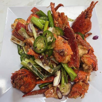 Fried lobster with scallions and jalapenos
