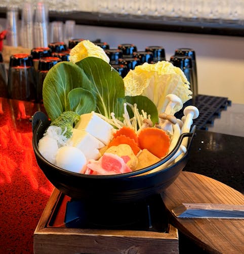 bok choy, napa cabbage, tofu, mushrooms, carrots, fish cake, egg and noodles